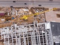 Aerial flight over construction site and construction crane. Aerial photography Royalty Free Stock Photo