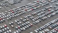 AERIAL: Flying above a massive parking lot in harbor full of newly imported cars