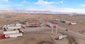 AERIAL: Flying around ConocoPhillips and Arby\'s sign board next to rest station.