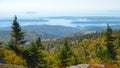 AERIAL Flying over the colorful woods in the breathtaking National Park in Maine