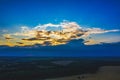 Aerial Flying over fields at harvesting time, sunset twilight time