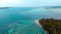 Aerial: flying over tropical island white beach caribbean sea turquoise water coral reef. Indonesia Sumatra Banyak islands. touris