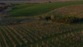 Aerial footage of an agricultural area and green rolling fields.