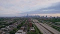 Aerial view of Chicago city skyline and highway at dusk
