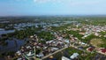 Aerial footage of suburb area that are assimilated with mangrove and fishpond