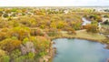 Aerial forest view residential subdivision and bright beautiful fall foliages colors suburbs Dallas, Texas, USA