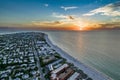 Aerial of Fort Myers beach with a cityscape view at sunset golden cloudy sky background Royalty Free Stock Photo