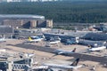 aerial of Frankfurt international airport with view to modern terminal and aircrafts at apron Royalty Free Stock Photo