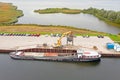 Aerial from freighter unloading sand in the countryside from Netherlands