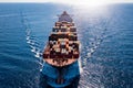 Aerial front view of a container cargo ship on open sea Royalty Free Stock Photo