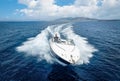 Aerial front view of a speedboat cruising over the sea Royalty Free Stock Photo