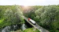 Aerial. The fuel gasoline truck is crossing the little rural bridge. Royalty Free Stock Photo