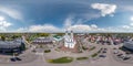 aerial full hdri 360 panorama view over square of historical center with white baroque catholic church in equirectangular