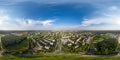 aerial full seamless spherical 360 hdri panorama view above road junction with traffic in city overlooking of residential area of