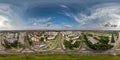 aerial full seamless spherical 360 hdri panorama view above road junction with traffic in city overlooking of residential area of Royalty Free Stock Photo