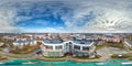 aerial full seamless spherical 360 hdri panorama view in city overlooking of residential area of high-rise buildings in