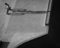 Aerial grayscale shot of TX biker at the skate park casting a long shadow Royalty Free Stock Photo