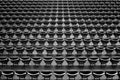 Aerial grayscale of theater seats in an empty stadium, top view of chairs