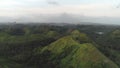 Aerial green mountain ranges at Mayon volcano, Legazpi, Philippines. Filipino hills scape at fog Royalty Free Stock Photo