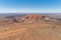 Aerial helicopter view of the west side of Uluru, also known as Ayers Rock, a large sandstone formation in Northern Territory
