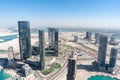 Aerial high shot of Al Reem island Sun and Sky towers, Gate towers and other landmarks in Abu Dhabi city, UAE Royalty Free Stock Photo