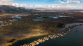 Aerial high view of Uros floating islands settlements at Lake Titicaca