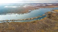 Aerial high view of Uros floating islands settlements at Lake Titicaca