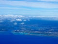 Aerial of Honolulu International Airport Coral Runway, Pearl Harbor, and City Royalty Free Stock Photo