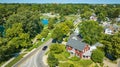 Aerial houses and neighborhood near Lakeside Park with distant view of pergola and gardens