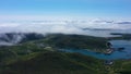 Aerial hyperlapse of clouds forming and moving over a coast of Avacha Bay, Petropavlovsk-Kamchatskiy, Kamchatka