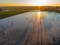 Aerial from ice skating at sunset on the ice rink in Koudum Friesland the Netherlands Royalty Free Stock Photo