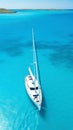 Aerial image of beautiful sailboat cruising in blue open ocean. Luxury white yacht. Generative AI Royalty Free Stock Photo