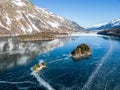 Aerial image of the Chaviolas islets on the frozen lake , St. Moritz, Switzerland Royalty Free Stock Photo