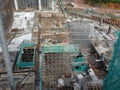 An aerial image of the construction site where the showing site progress is ongoing progressively during the daytime.