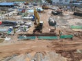 An aerial image of the construction site where the showing site progress is ongoing progressively during the daytime.