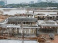 An aerial image of the construction site where the showing site progress is ongoing progressively during the daytime.