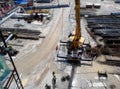 An aerial image of the construction site where the showing site progress is ongoing progressively during the daytime.