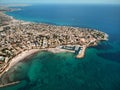 Aerial image drone point of view turquoise bay of Mediterranean Sea waters and coastline Cabo Roig Torrevieja