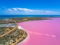 Aerial image of the Pink Lake and Gregory in Western Australia with Indian Ocean in background