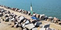 Aerial image of sailing wagons moving on rails at the end of the breakwater 4km into the ocean on a sunny day at a beach in Royalty Free Stock Photo