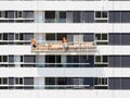 Aerial image of a suspended platform for cleaning windows in a building in Lima Peru. Royalty Free Stock Photo
