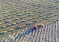 Aerial image of tractor with hay tedders