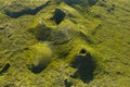 Aerial image of typical green volcanic caldera crater landscape with volcano cones of Planalto da Achada central plateau of Ilha Royalty Free Stock Photo