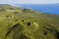 Aerial image of typical green volcanic caldera crater landscape with volcano cones of Planalto da Achada central plateau of Ilha Royalty Free Stock Photo