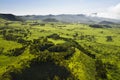 Aerial image of typical green volcanic caldera crater landscape with volcano cones of Planalto da Achada central plateau of Ilha Royalty Free Stock Photo