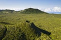 Aerial image of typical green volcanic caldera crater landscape with volcano cones of Planalto da Achada central plateau of Ilha Royalty Free Stock Photo