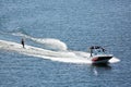 An aerial image of water skiing behind a boat Royalty Free Stock Photo