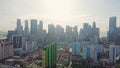 Aerial 4k footage of Singapore city skyline with residential buildings and cars.