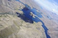 Aerial lake view of Canterbury landscape through perspex canopy from within glider cockpit in flight