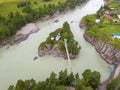 Aerial of a landmark in the Altai Territory Patmos Island with a monastery church and a suspended wooden bridge Royalty Free Stock Photo